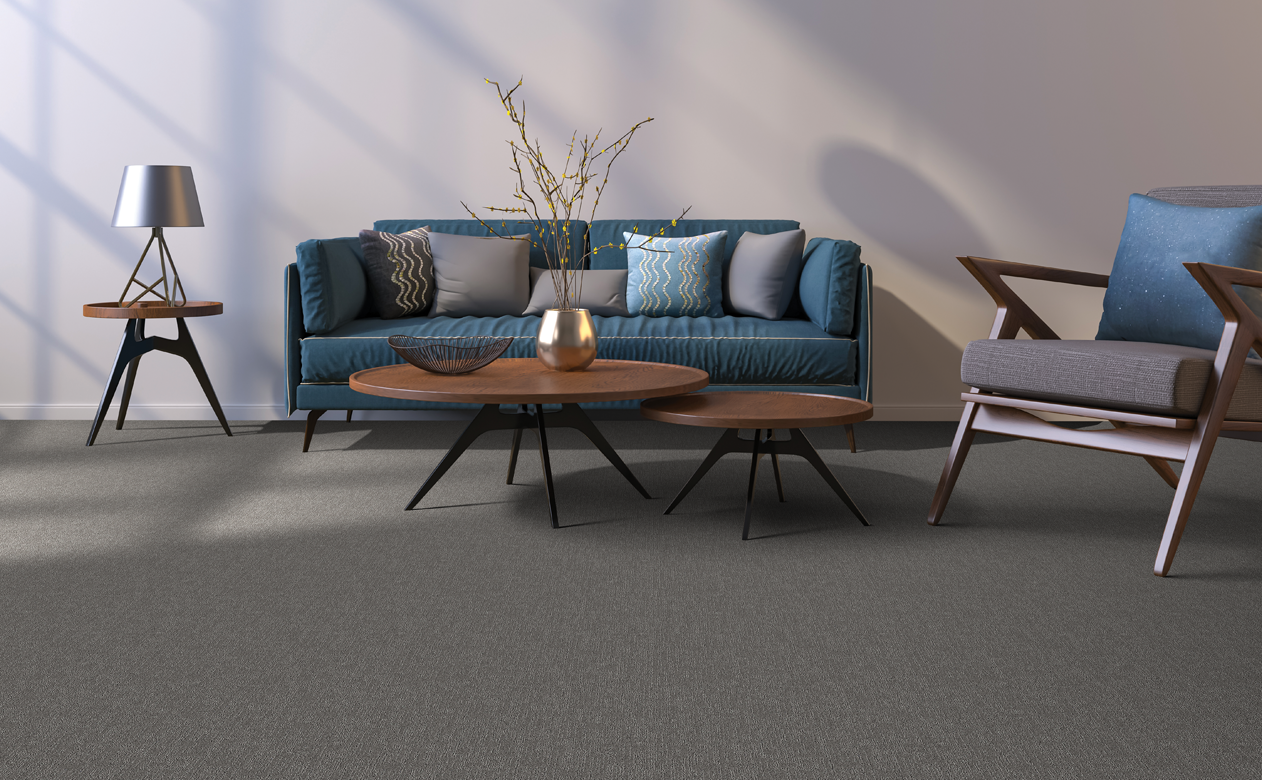 Blue sofa in modern living room with Berber carpet 